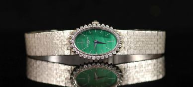 with oval malachite dial and diamond set bezel, overall 17cm, gross weight 38.6 grams, with Chopard