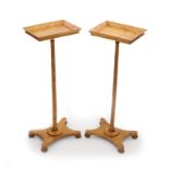 A pair of early Victorian satinwood flower stands,with galleried rectangular tops, on slender
