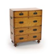 An early Victorian brass mounted teak campaign chest,with two short and three long drawers, fitted