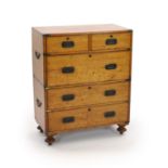 An early Victorian brass mounted teak campaign chest,with two short and three long drawers, fitted