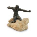 Alfredo Pina (1883-1966). A bronze figure of Héraclès kneeling upon a rocky mound,signed on the