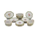A Berlin porcelain dessert service, mid 19th century,each piece of octagonal shape, painted with