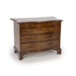 A George III serpentine mahogany chest,of four graduated long drawers, on bracket feet, Norman