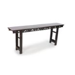 A large Chinese hongmu altar table, 19th centurythe frieze carved and pierced with fruiting