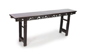 A large Chinese hongmu altar table, 19th centurythe frieze carved and pierced with fruiting