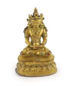 A Tibetan gilt copper alloy seated figure of Amitayus, possibly 15th/16th century,seated in