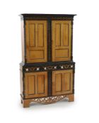 A mid 19th century Ceylonese satinwood and ebony side cabinet,with moulded cornice, blind fretwork