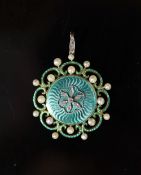 A Belle Epoque gold, green enamel, seed pearl and rose cut diamond set circular pendant,with glazed