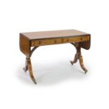 A late George III satinwood banded mahogany sofa table,with ebonised moulding to the edges, D