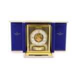 A Jaeger le Coultre Atmos clockwith lacquered gilt case and Arabic/ baton dial, movement no.307442,