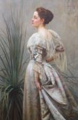 Henry John Hudson (1881-1912)Portrait of a lady standing in an elegant ballgown, beside a palm,Oil