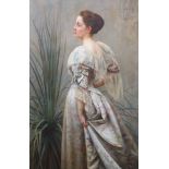 Henry John Hudson (1881-1912)Portrait of a lady standing in an elegant ballgown, beside a palm,Oil