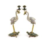 A pair of Chinese cloisonné enamel and gilt bronze ’crane’ candlesticks, early 20th century,each