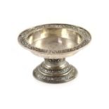 A late 19th/early 20th century South East Asian silver pedestal bowl,decorated with birds amongst