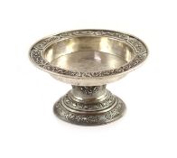 A late 19th/early 20th century South East Asian silver pedestal bowl,decorated with birds amongst