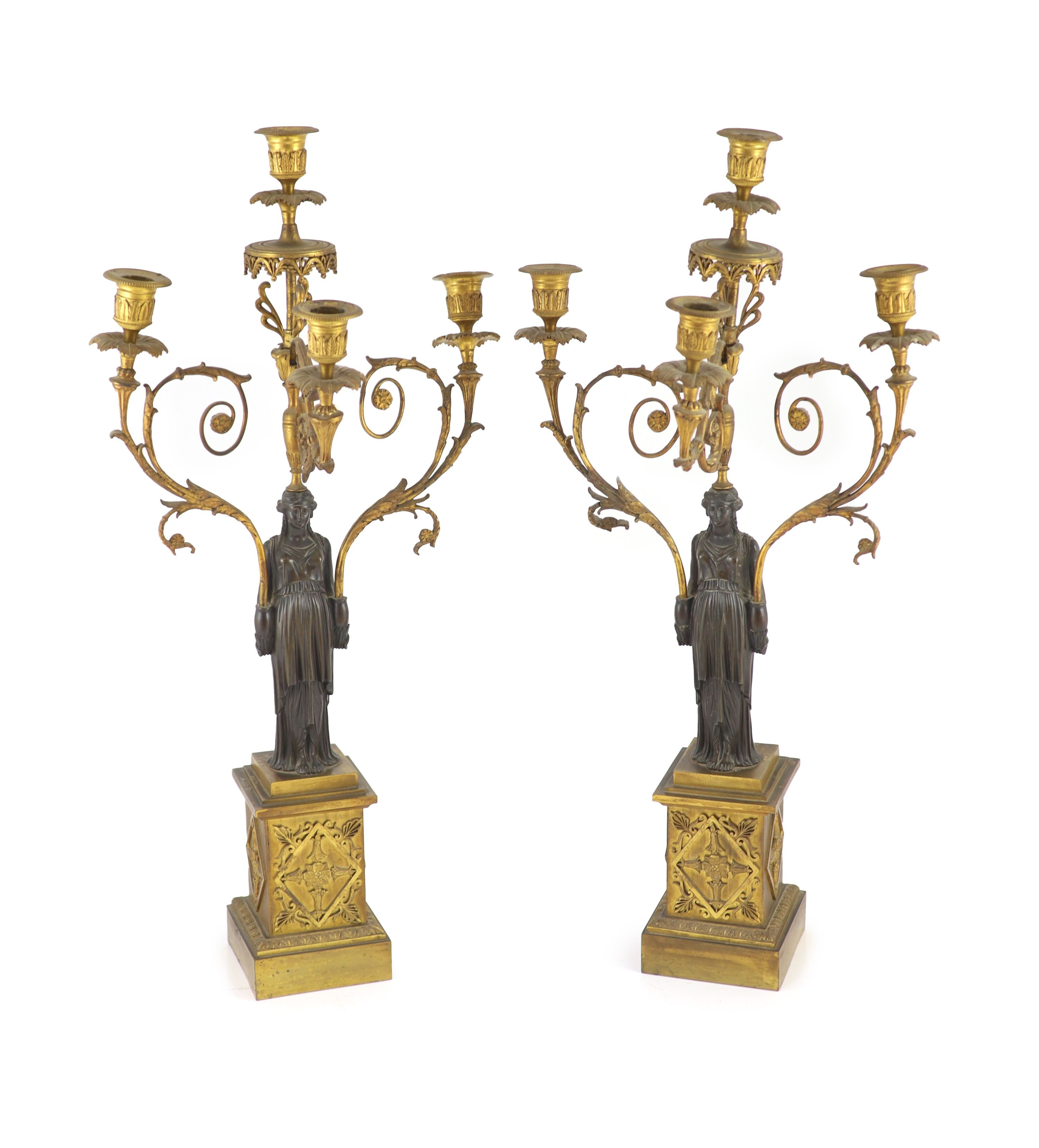 A pair of 19th-century French bronze and ormolu candelabrawith scrolling branches and classical