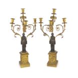 A pair of 19th-century French bronze and ormolu candelabrawith scrolling branches and classical