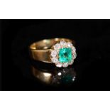 A gold, emerald and old cut diamond set circular cluster ring,size O/P, gross weight 6.3 grams.