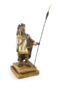 After Carl Kauba, a gilded, silvered and patinated bronze figure of a Native American chieftain,