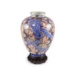 A large Japanese Imari ovoid vase, Meiji period, by Fukagawa,painted with a phoenix amid brocade