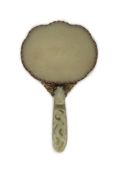 A Chinese pale celadon jade mounted hand mirror, the jade 18th/19th century,the back of the mirror