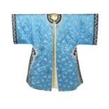 A Chinese blue silk ‘butterfly’ Winter robe, late 19th century,embroidered with butterflies on a