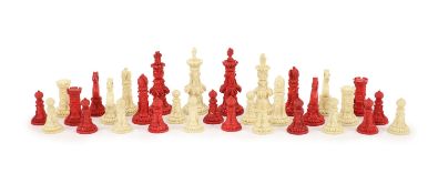 A 19th century Anglo-Indian white and stained bone chess set, with unusual carved palmate