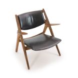 A Hans Wagner for Carl Hansen & Son oak and plywood armchairwith black leather upholstery and