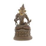 A Himalayan bronze seated figure of Vajrasattva, 18th/19th century,seated in dhyanasana on a