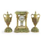 A green onyx and gilt metal clock garniture, comprising a four-glass regulator with enamelled dial