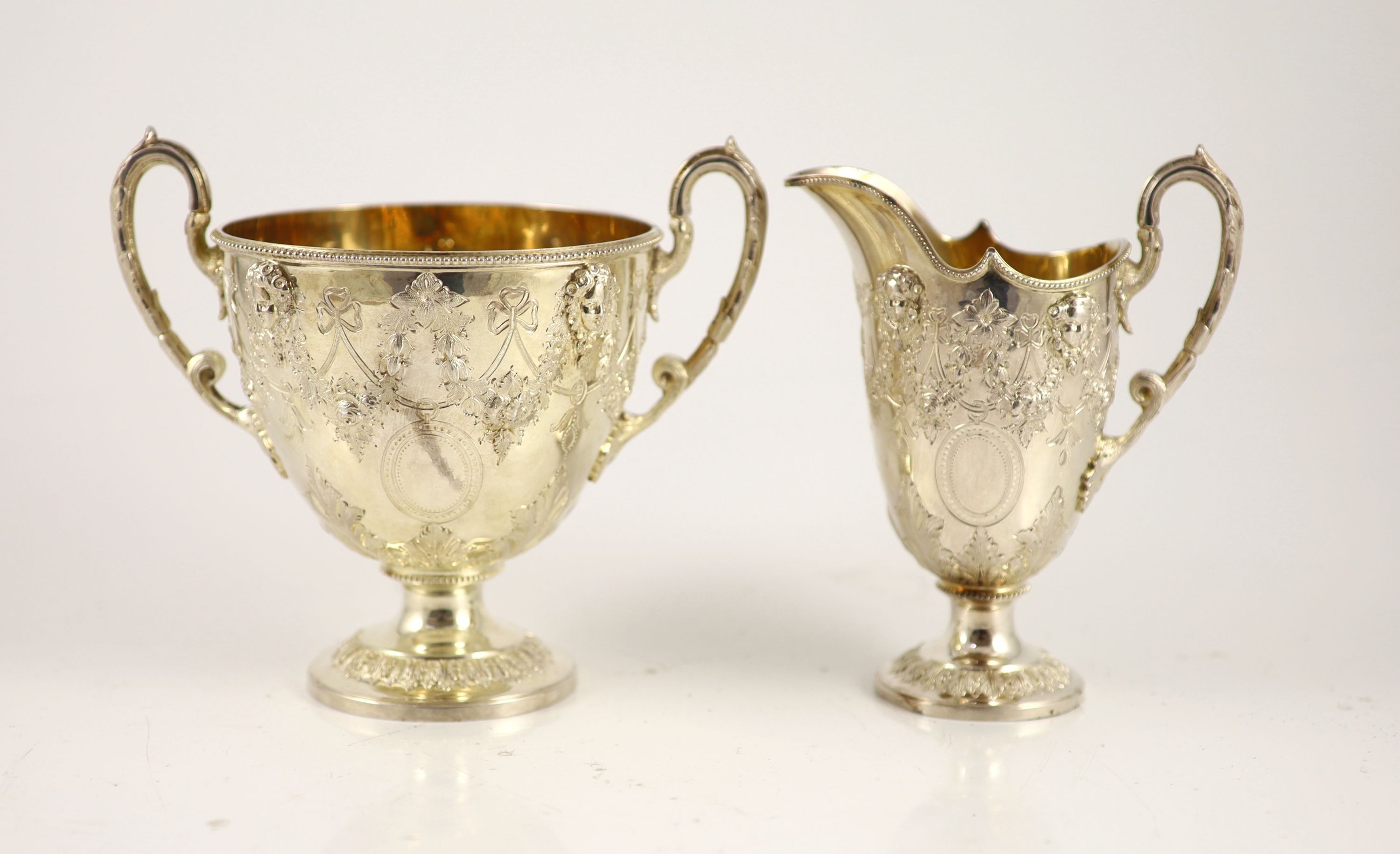 A Victorian embossed silver four-piece tea and coffee service of classical vase form, London 1886, - Image 4 of 6