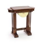 An unusual George IV nest of rosewood quartetto sewing tables,the top table with D shaped hinged