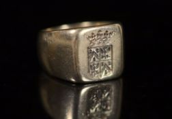 Cartier NY - an 18ct yellow gold signet ring, with intaglio armorial matrix, inner shank