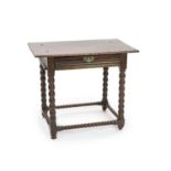 A Charles II rectangular oak side tablewith rectangular top and moulded freeze draw on bobbin