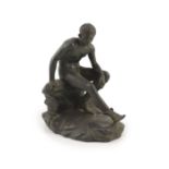 After the Antique, a Grand Tour bronze figure of Hermesseated upon a rock,H 19cm. W 19cm.