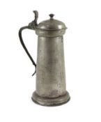 An early 17th century pewter flagon of tall cylindrical form, maker's mark 'BB'H 37cm.