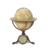 A George III terrestrial table globe by Dudley Adams of Charing Cross, Londonon original mahogany