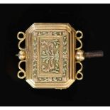 A 19th century three colour gold cased musical watch key,of rectangular form, with canted