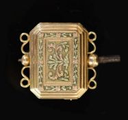 A 19th century three colour gold cased musical watch key,of rectangular form, with canted