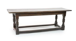 A Charles I oak refectory table, possibly West Country, having three-plank topProvenance: The