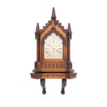 A Victorian golden oak Gothic design chiming bracket clock by Gillett & Bland, Steam Clock Factory,