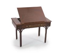 A George III mahogany architect's table,with central rising section to the top, compartmented