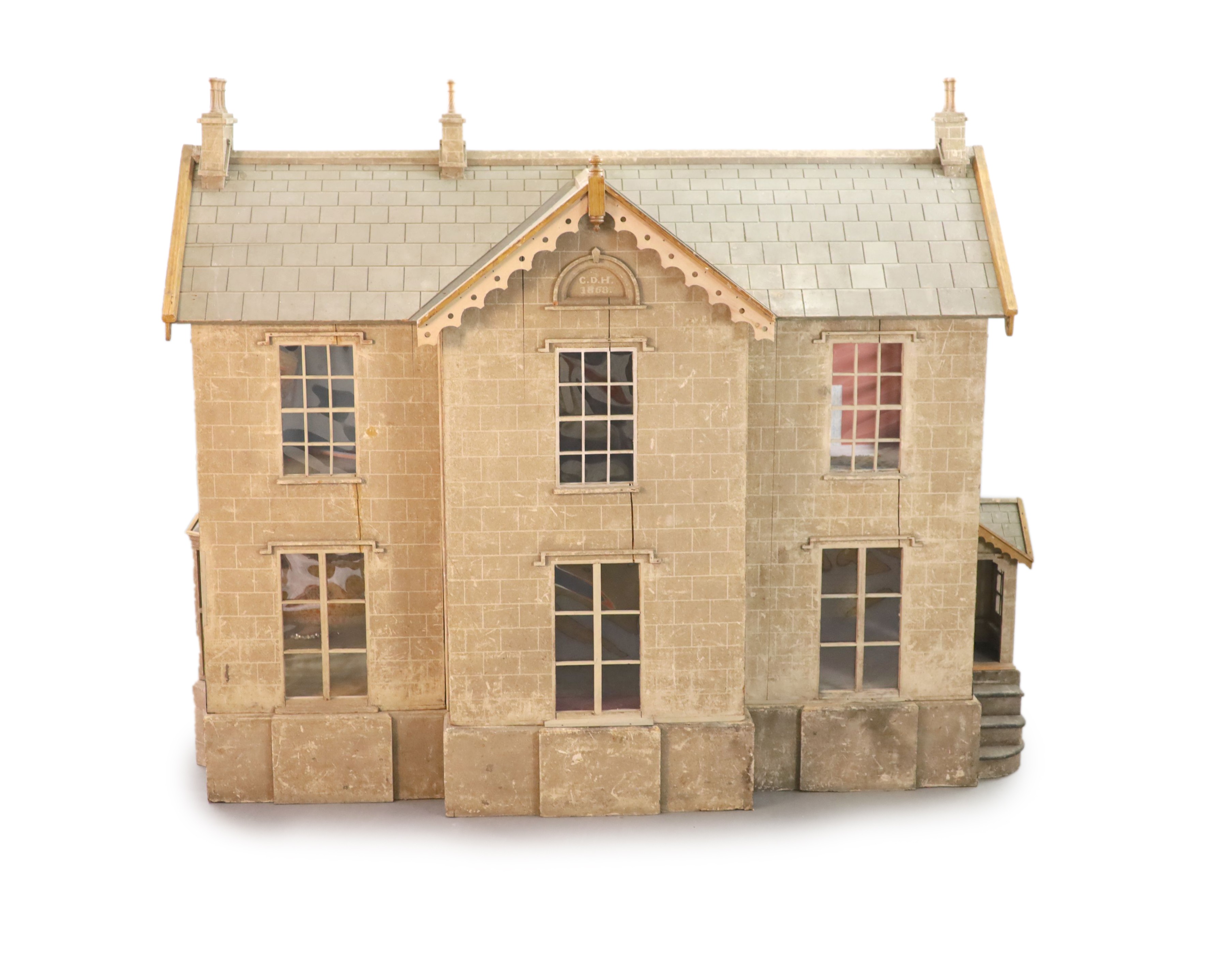 An unusually large painted pine doll's house, modelled upon a Victorian lodge house, Estate