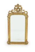 A 19th century French carved giltwood and gesso wall mirrorwith arched plate and ripple moulded