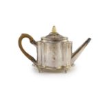 A George III silver bright cut engraved oval teapot and stand, Thomas Daniell (a.f.),with pineapple