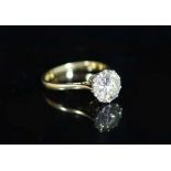 An 18ct gold and solitaire diamond ring,the stone with an approximately estimated weight of 2.20ct