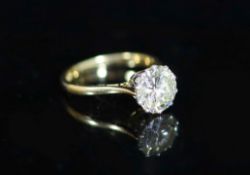 An 18ct gold and solitaire diamond ring,the stone with an approximately estimated weight of 2.20ct