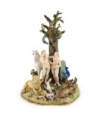 A Meissen figural group of the Garden of Eden, 19th century,modelled with Adam and Eve standing