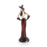 Stefan Dakon for Goldscheider, an Art Deco pottery figure of a girl wearing a Sombrero, c.1935,