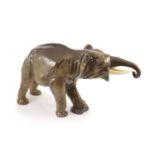 A large Royal Doulton pottery figure of an elephant, HN2640, probably a prototype model,green